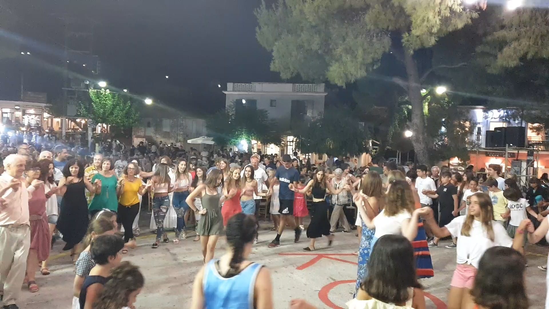 a large group of people dancing