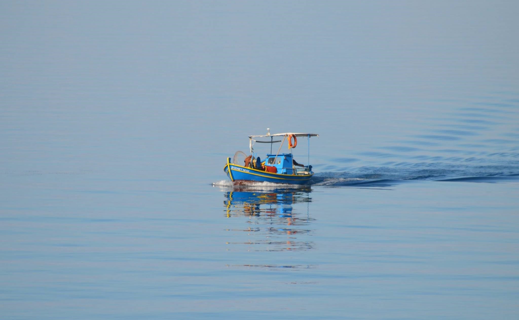 a boat sailing on the water