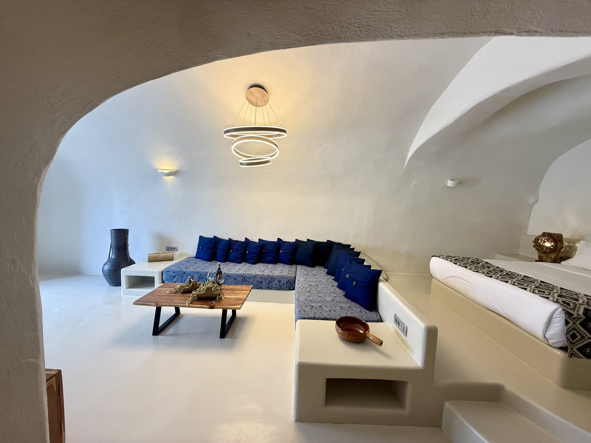 a room with a bed and a table