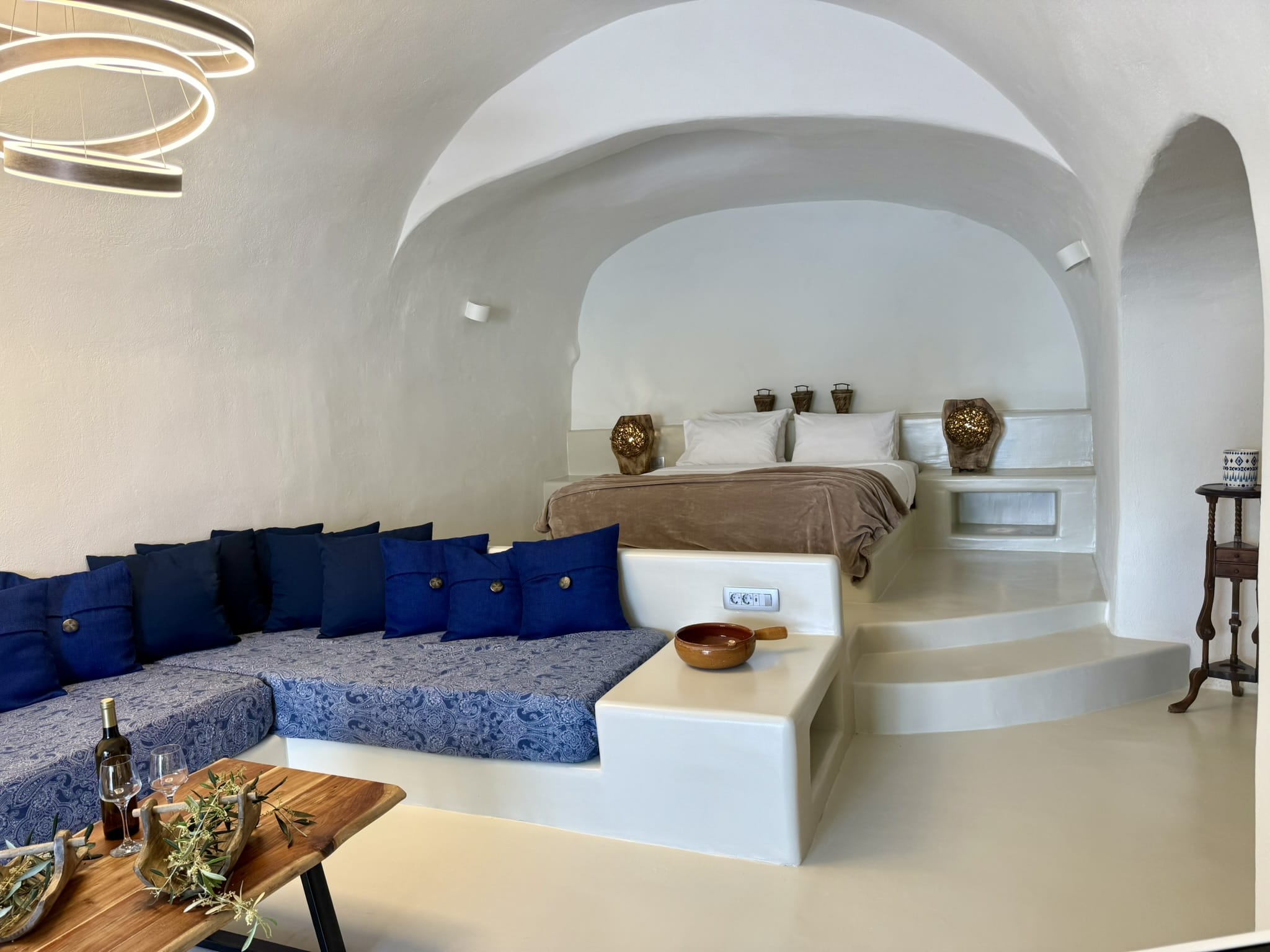 a room with a bed and couch