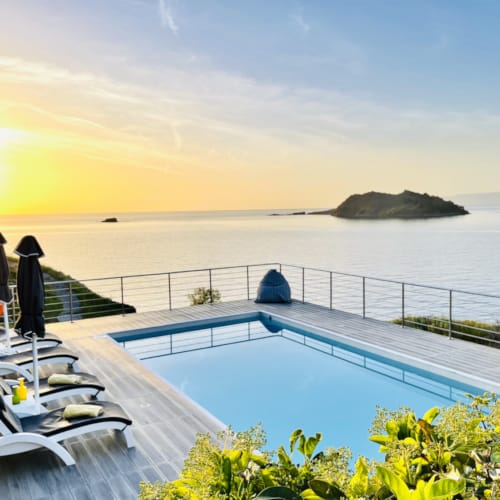 a pool next to a beach