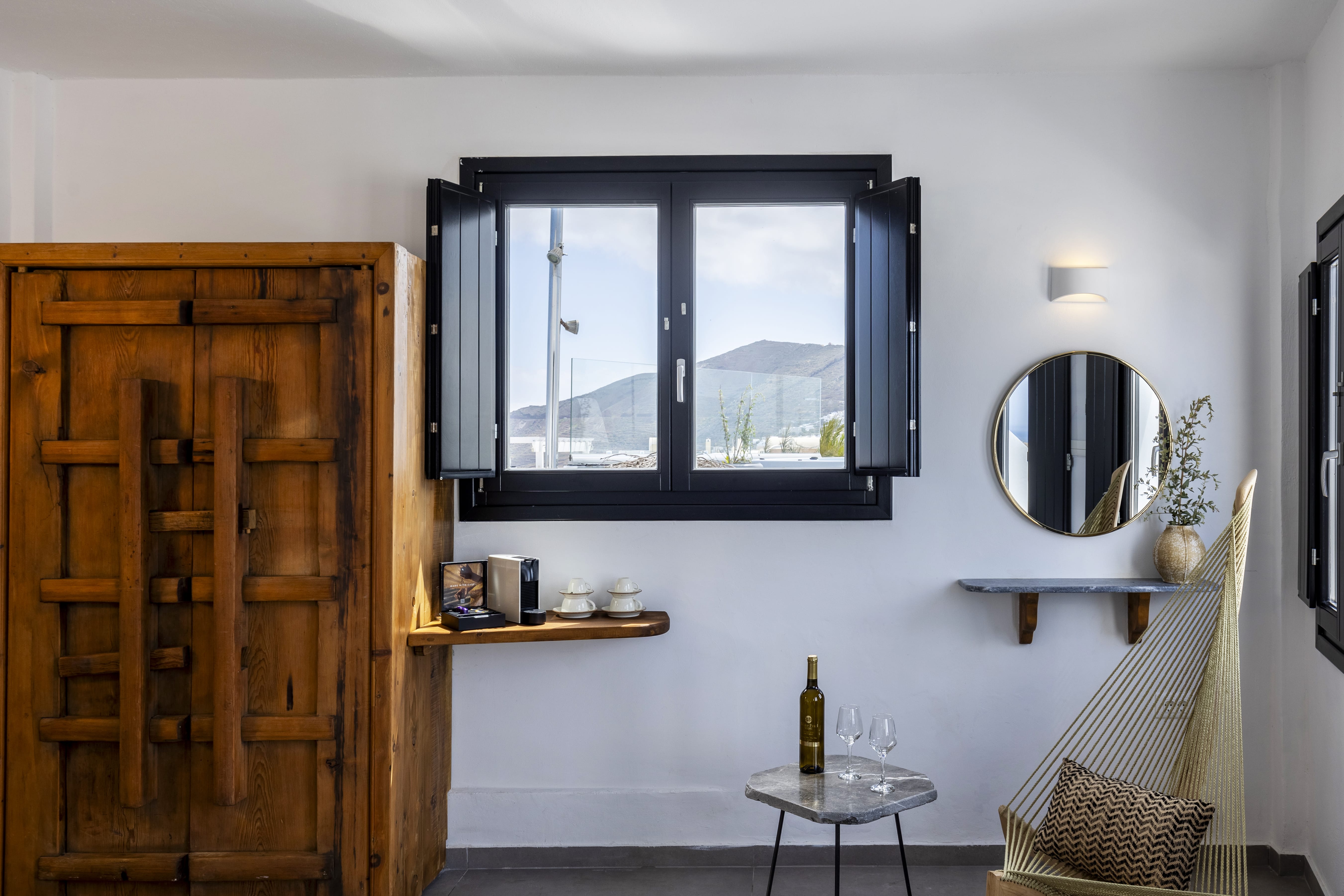 a room with a table and a mirror