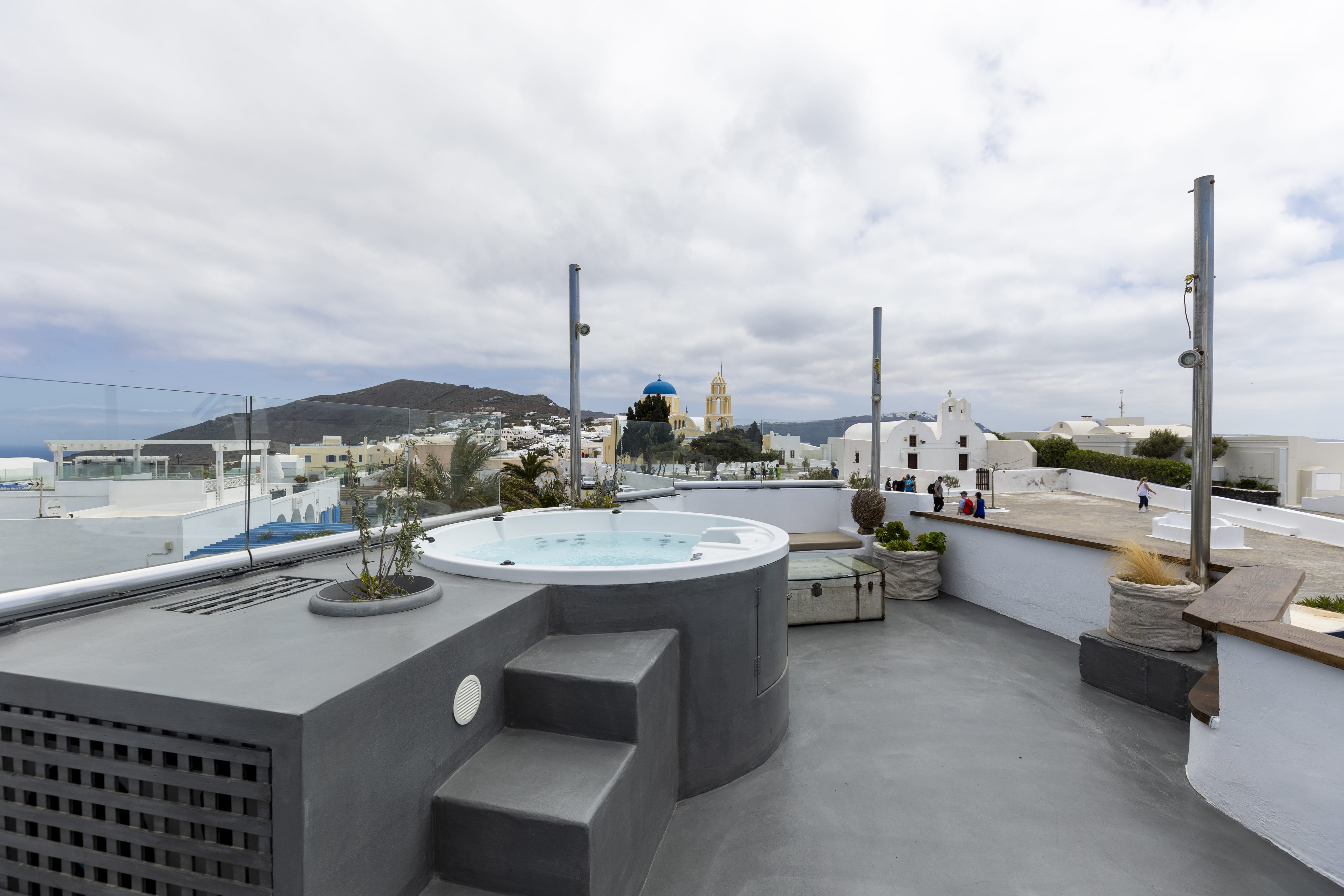 a rooftop with a pool