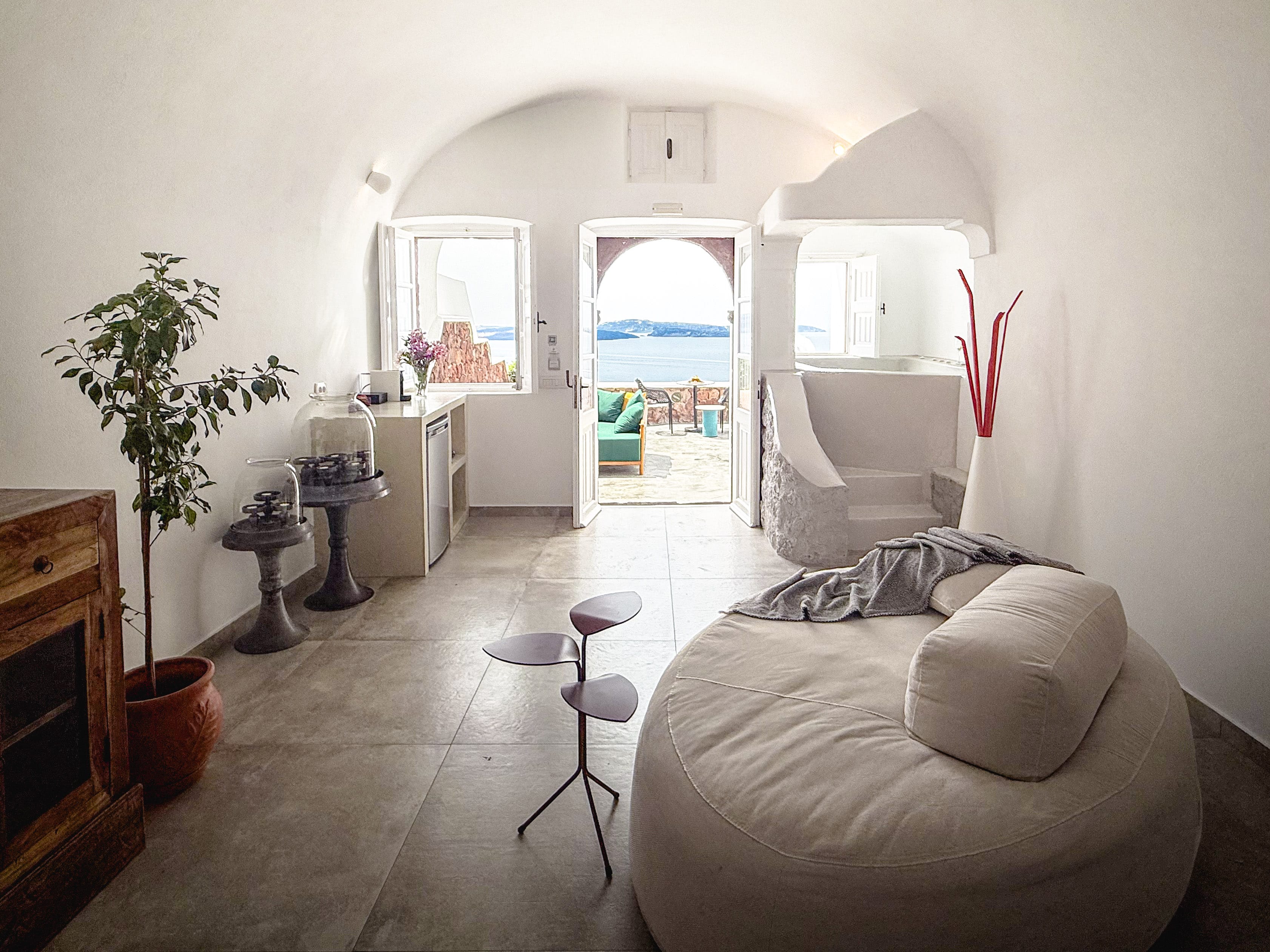 a living room with a couch and a table