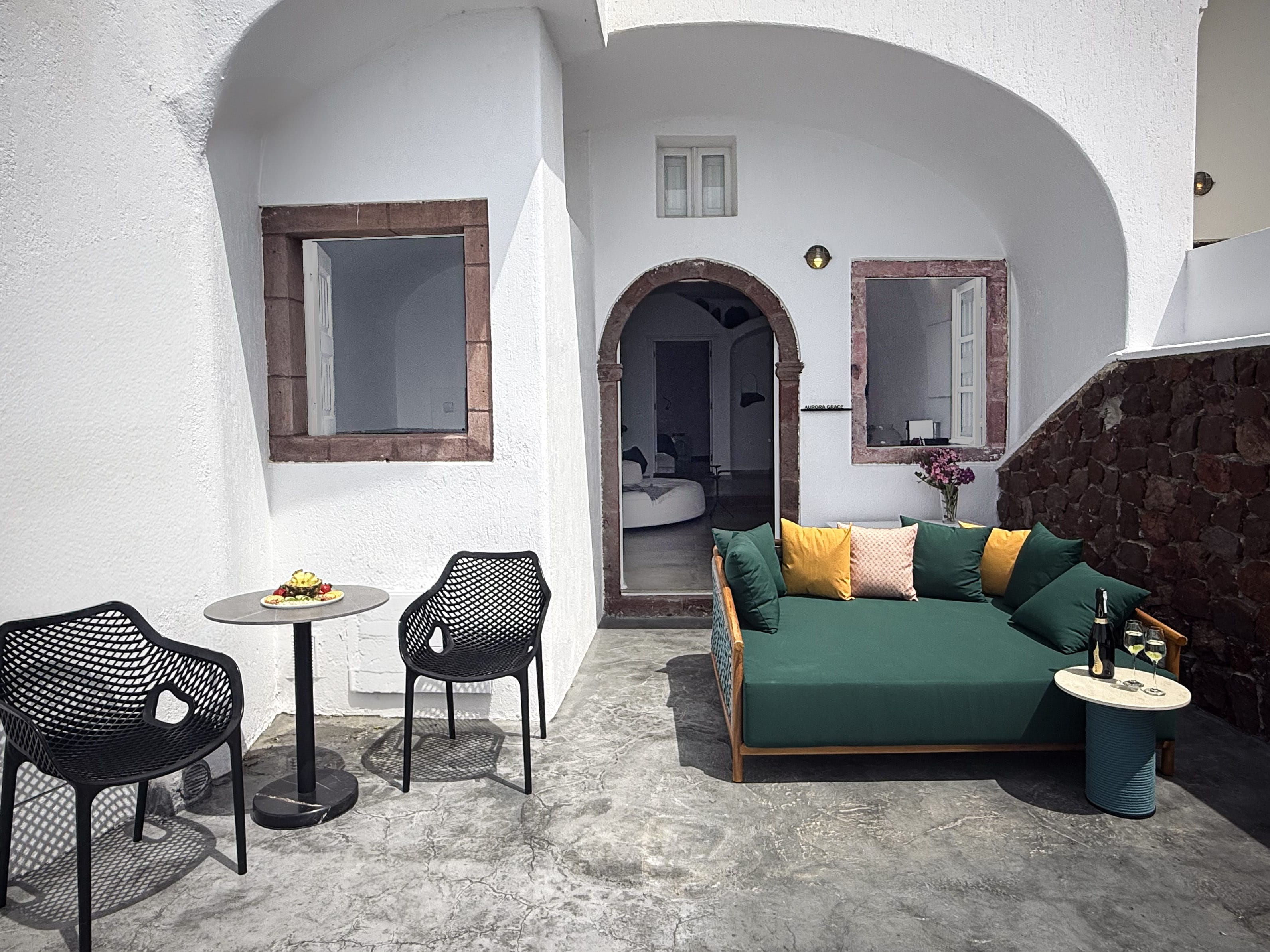 a living room with a green couch