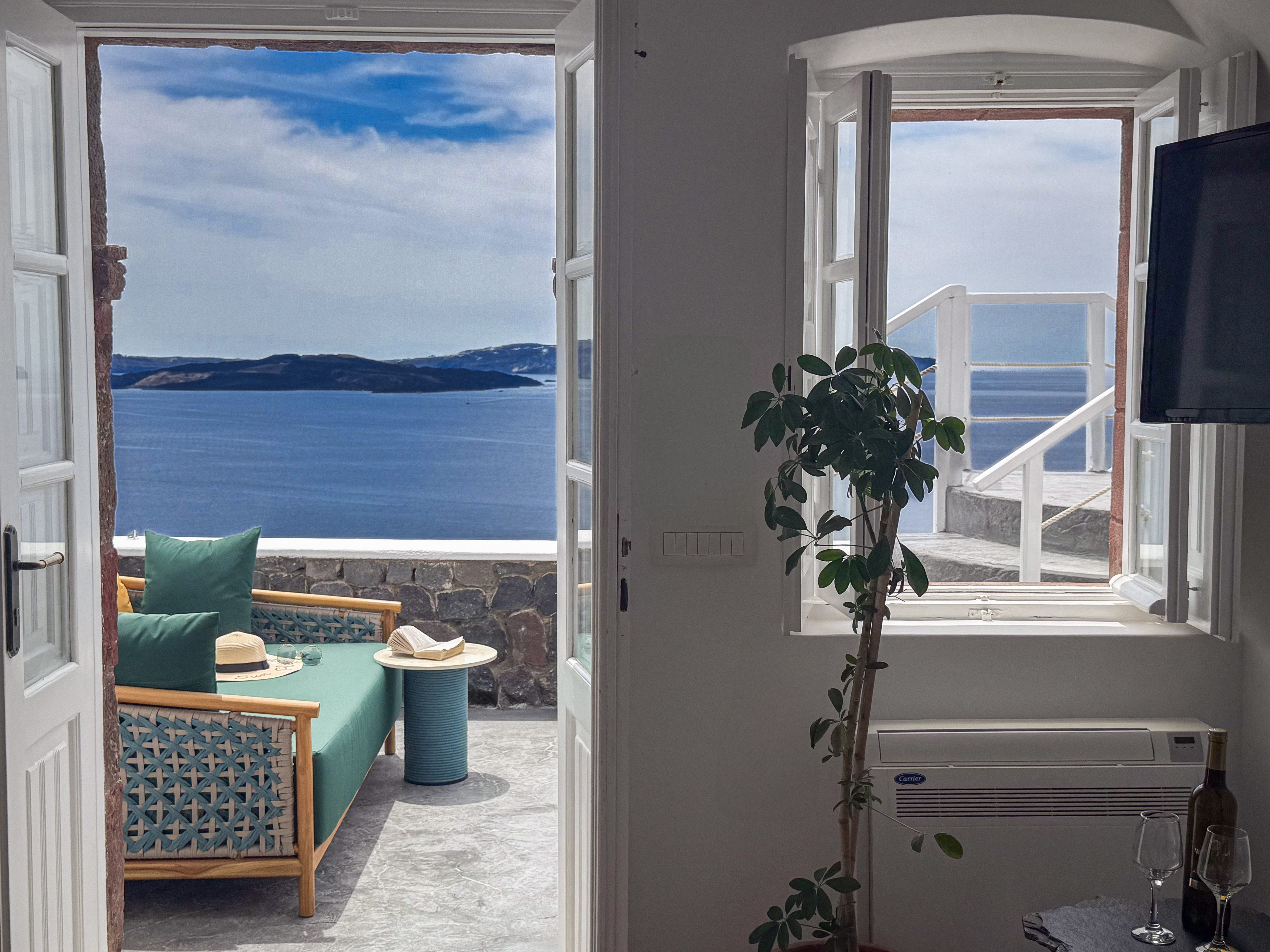 a room with a window and a plant in it