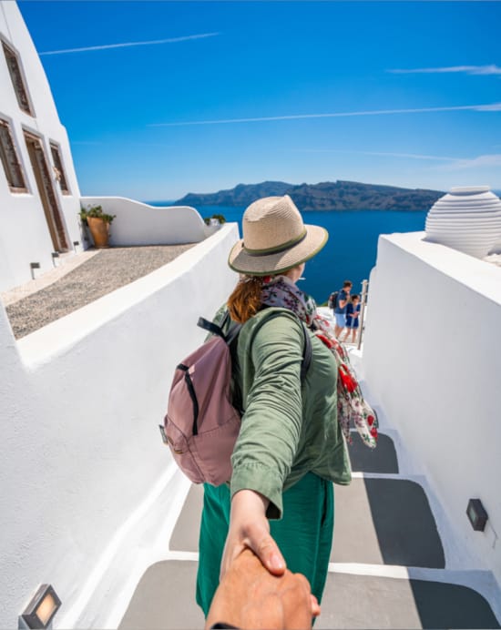 a person wearing a hat and carrying a backpack