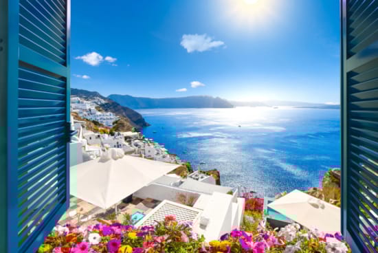 a building next to a body of water