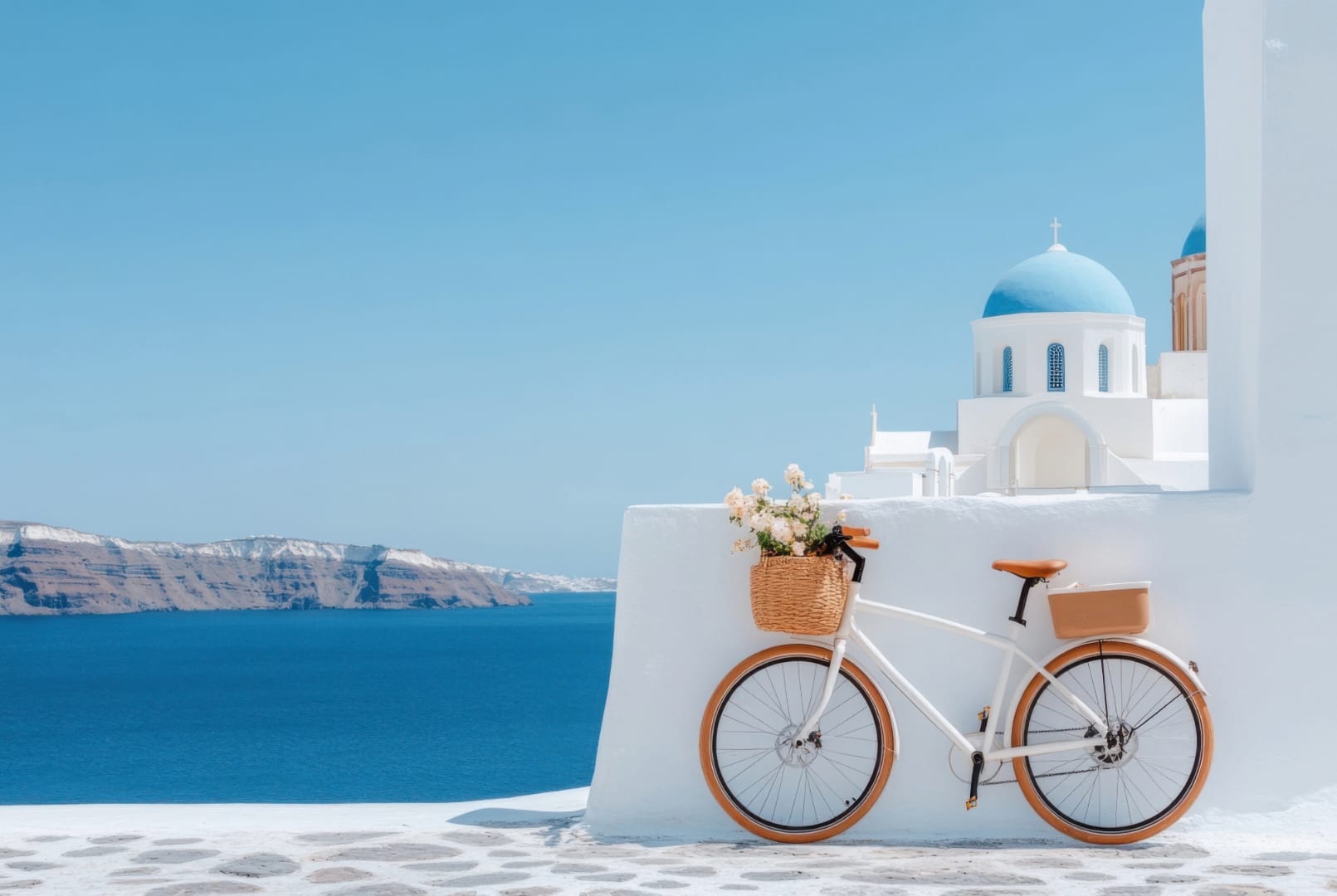 a bicycle parked on a beach