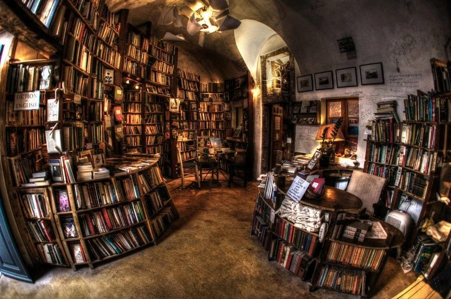 a room with shelves of books