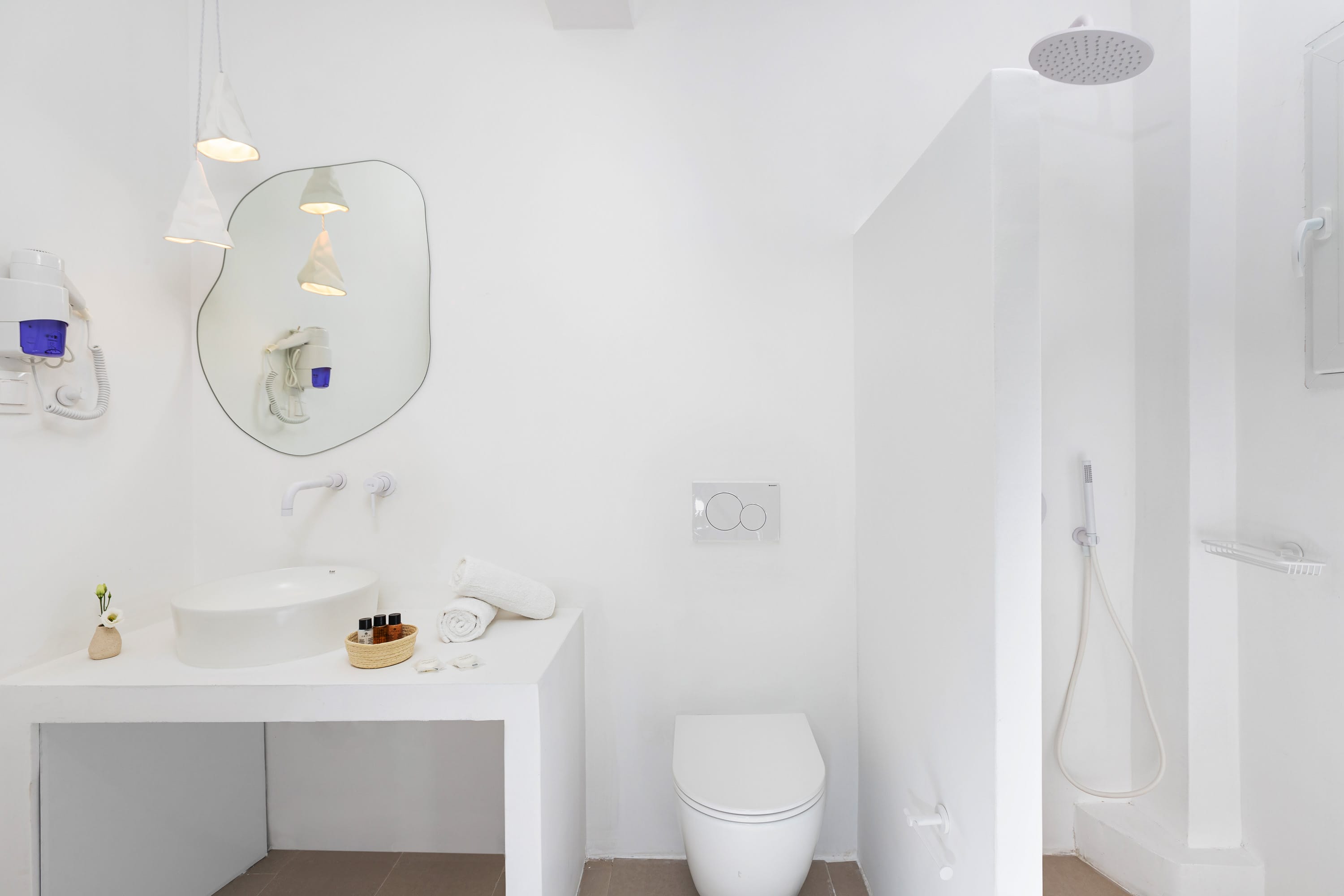 a bathroom with a toilet and sink