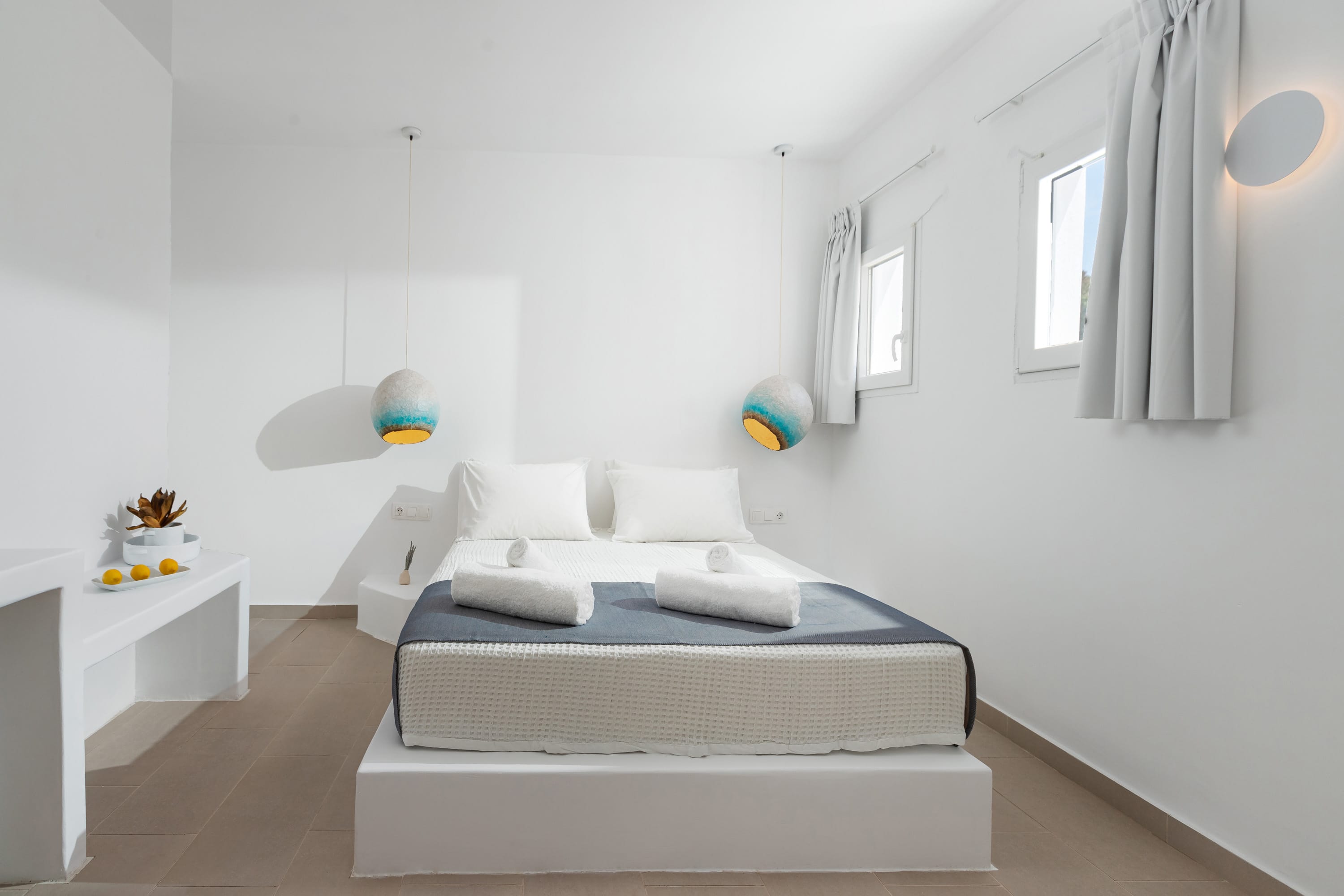 a room with a bed and a table