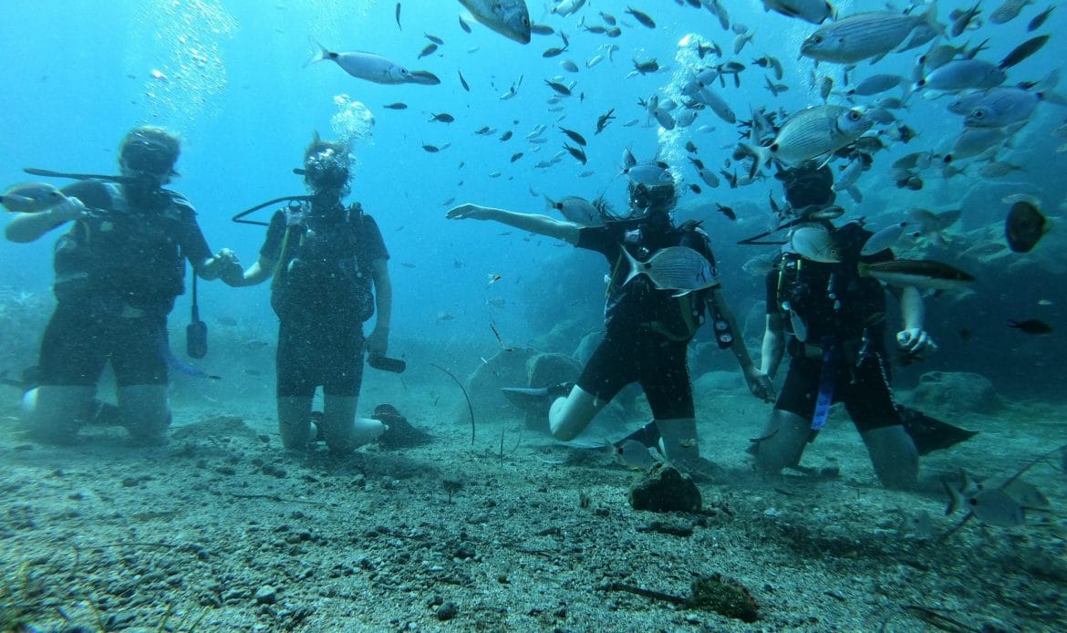 a group of people in scuba gear