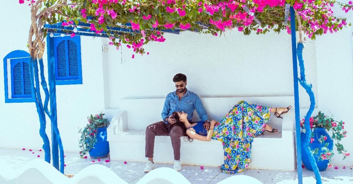 a man sitting on a bed