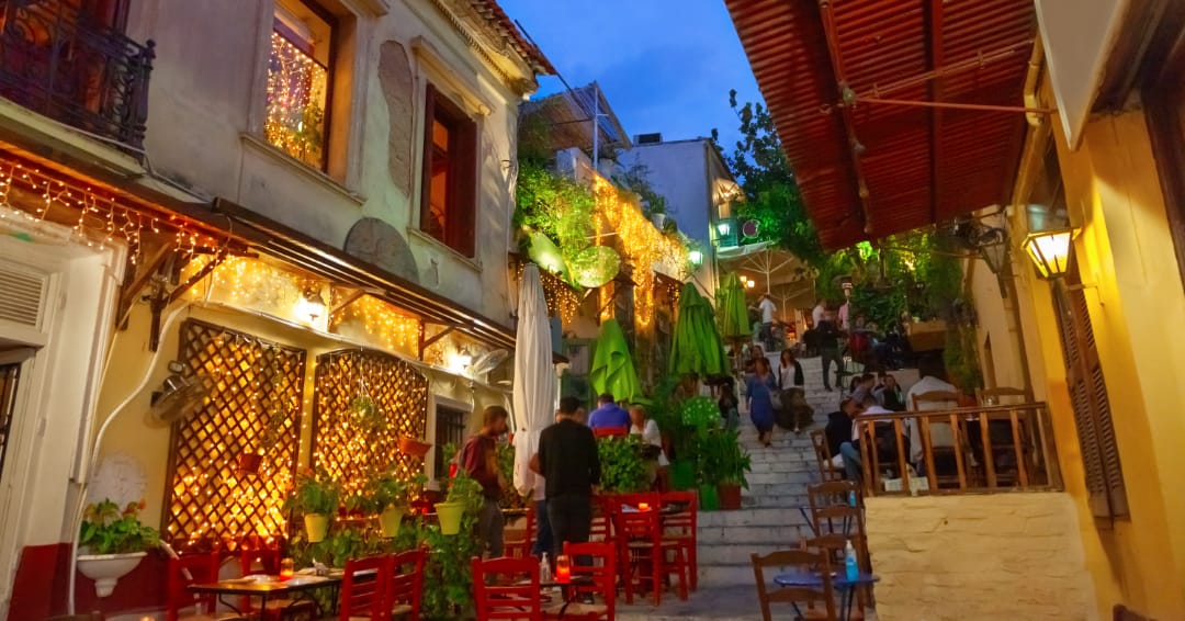 a group of people walking through a building