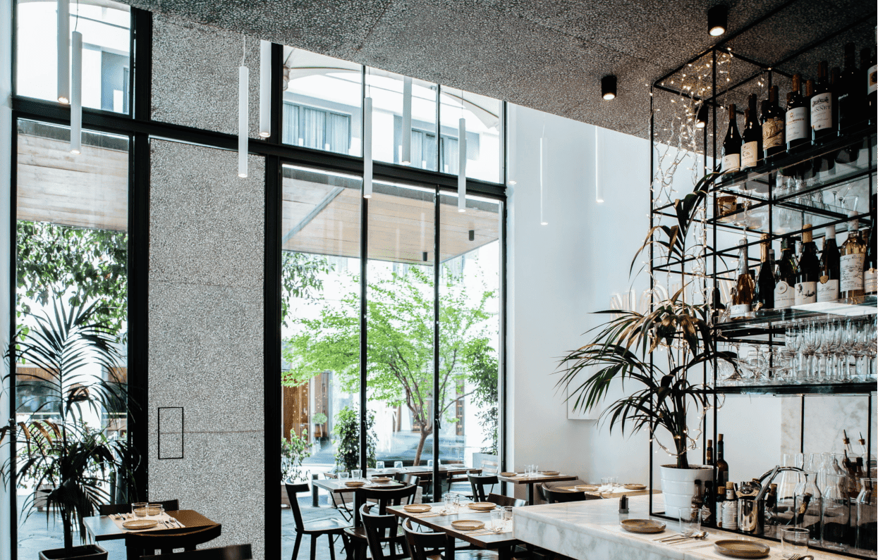 a room with tables and chairs