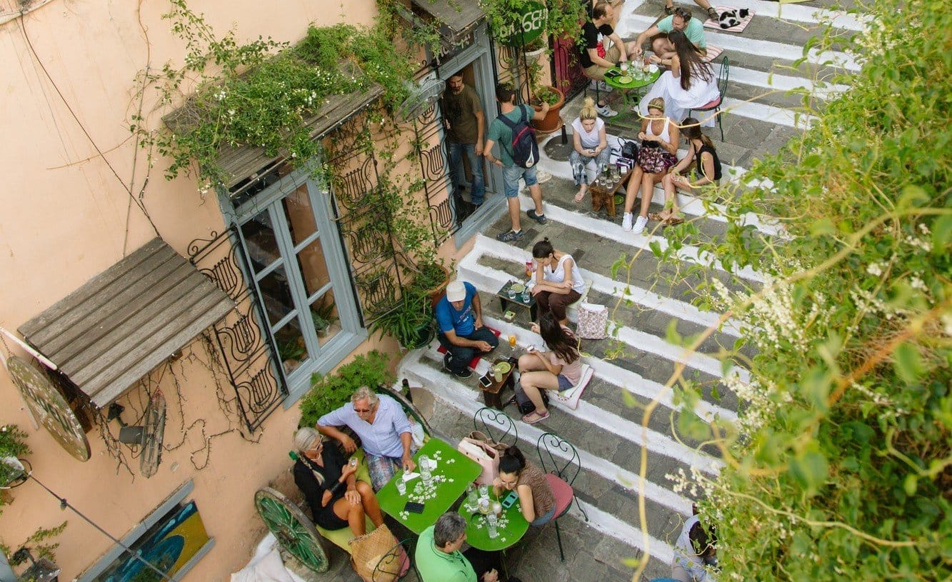 a group of people sitting on stairs