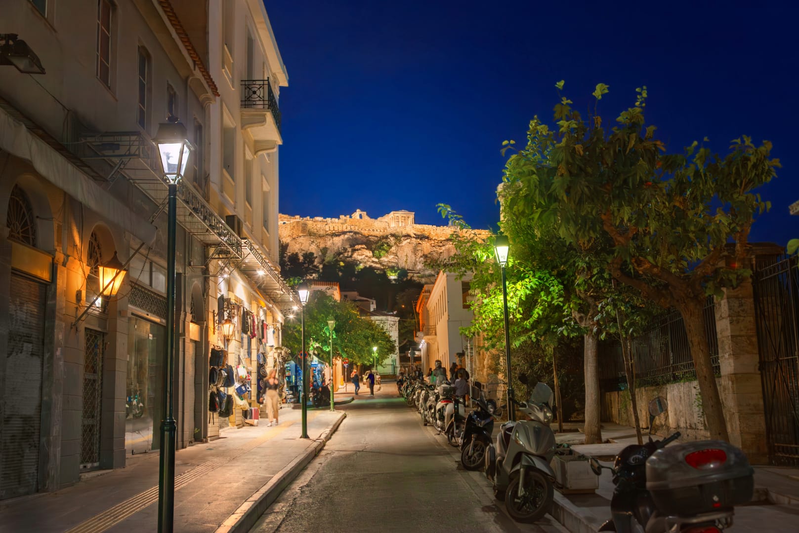 a street with bikes parked on the side