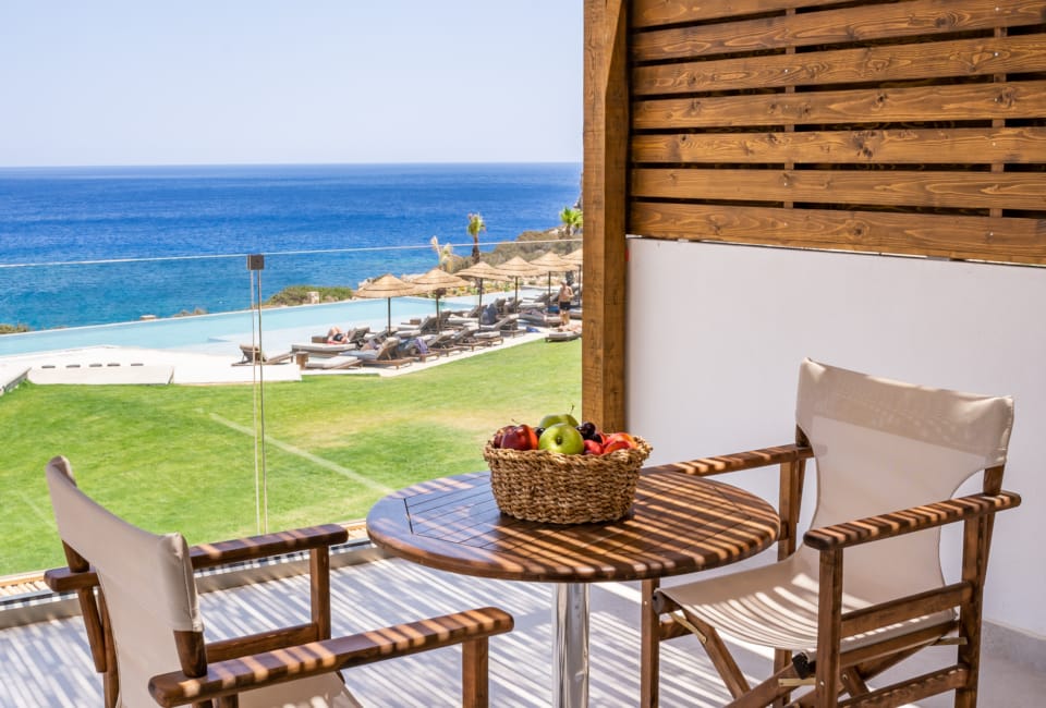 a table and chairs on a deck