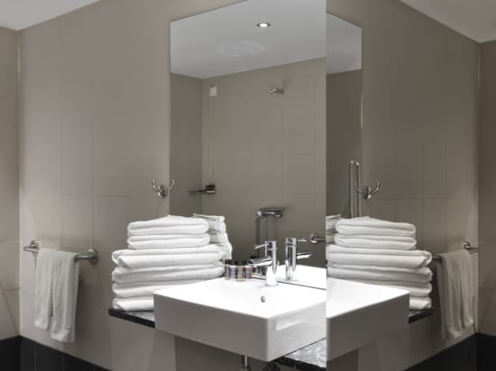 a bathroom with a large mirror