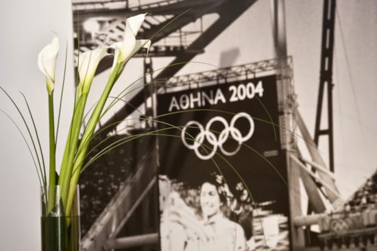 a vase with white flowers