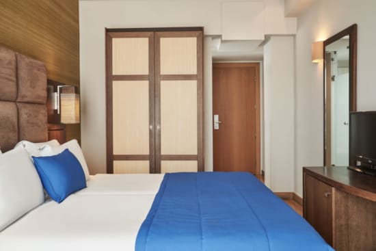 a room with a bed and a couch