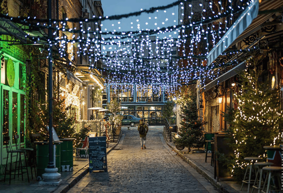 a street with christmas lights