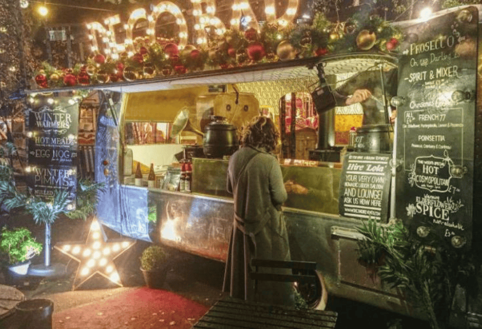 a person standing in front of a bar