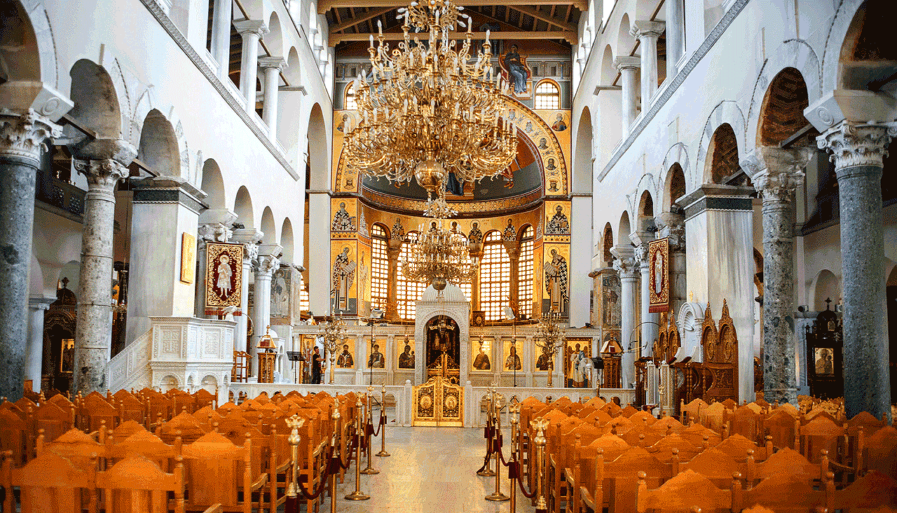 a large room with a large chandelier and many candles