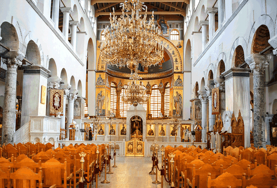 a large room with a large chandelier and many candles