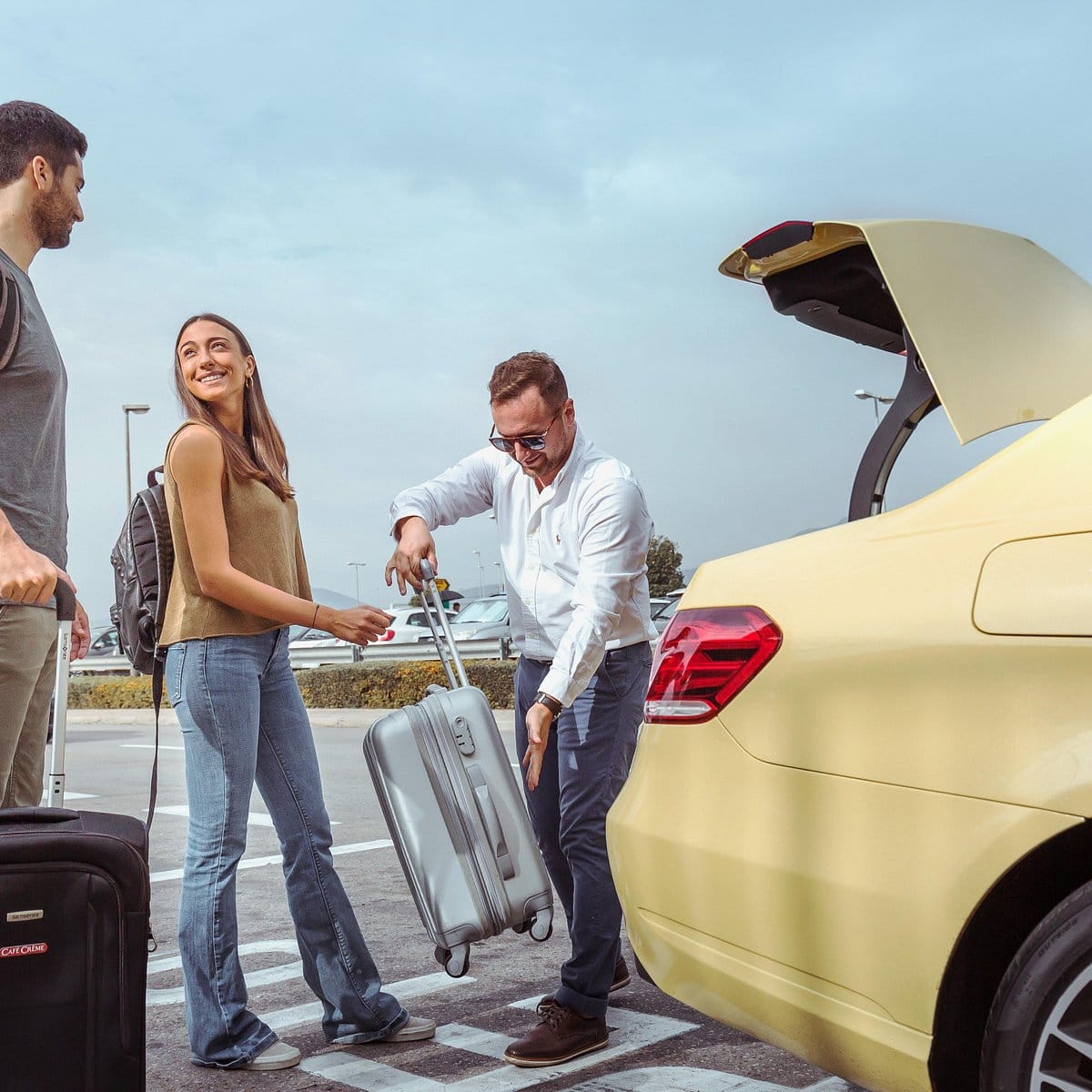 a man and woman with luggage