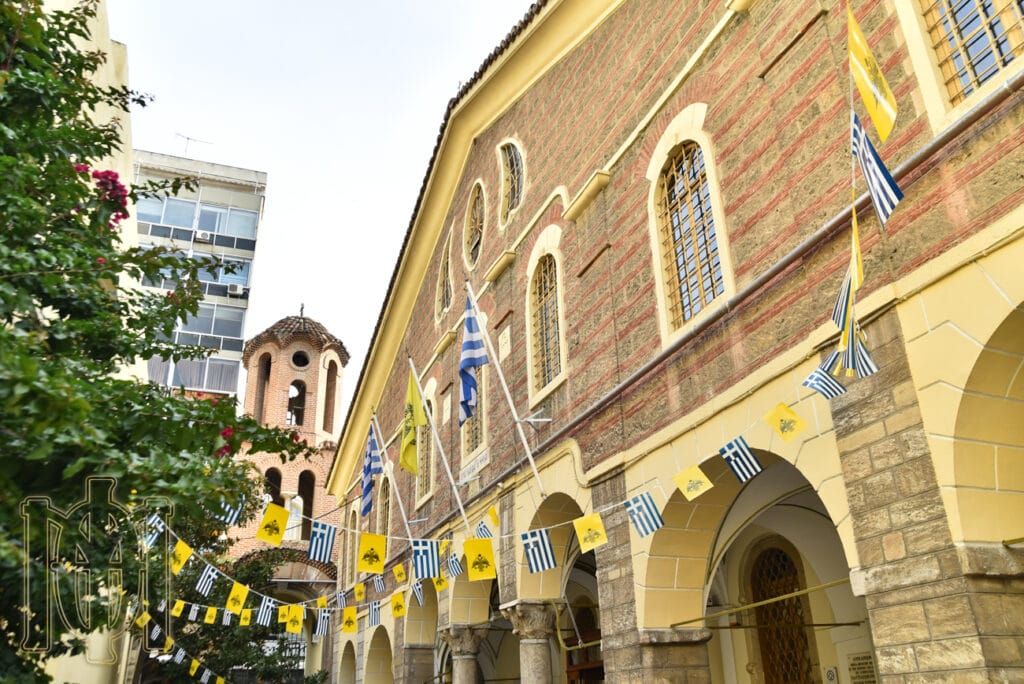 a building with flags on the outside