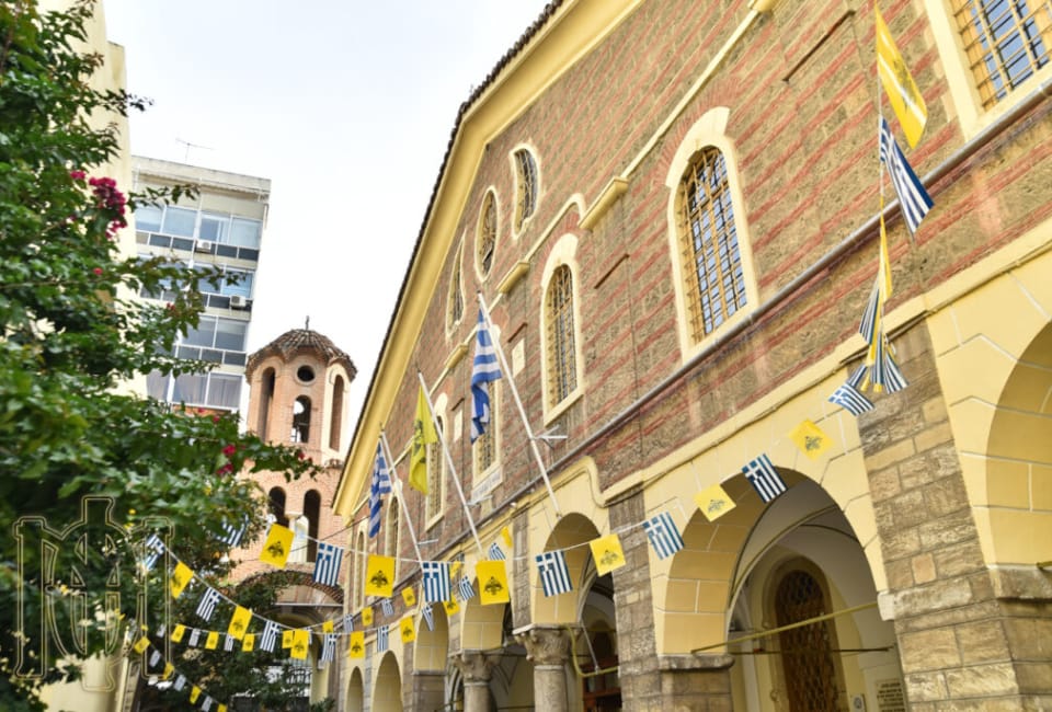 a building with flags on the outside