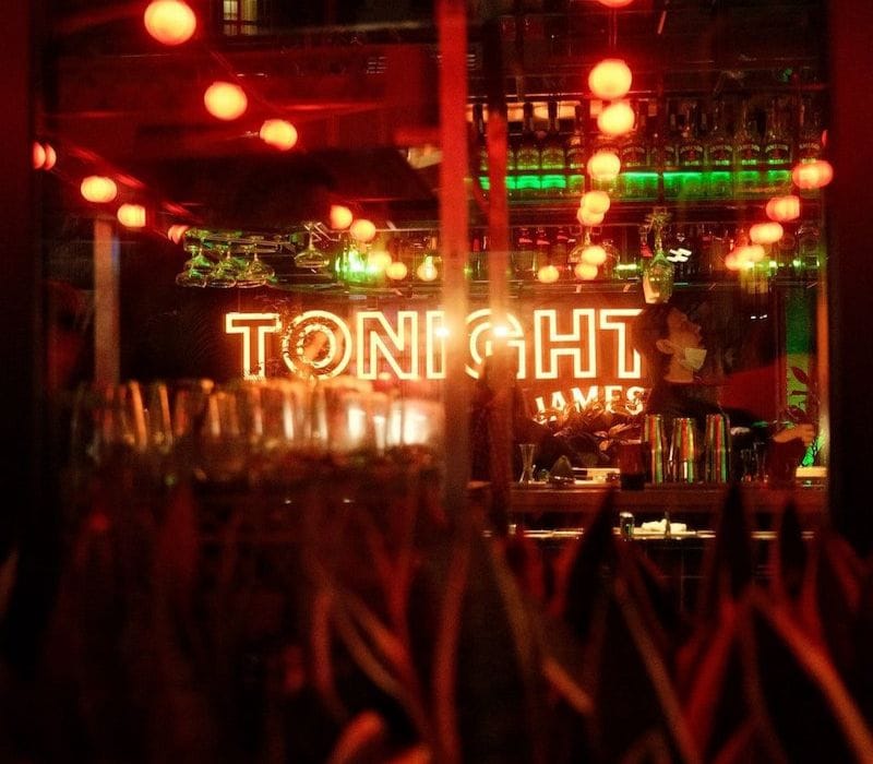 a stage with lights and a sign