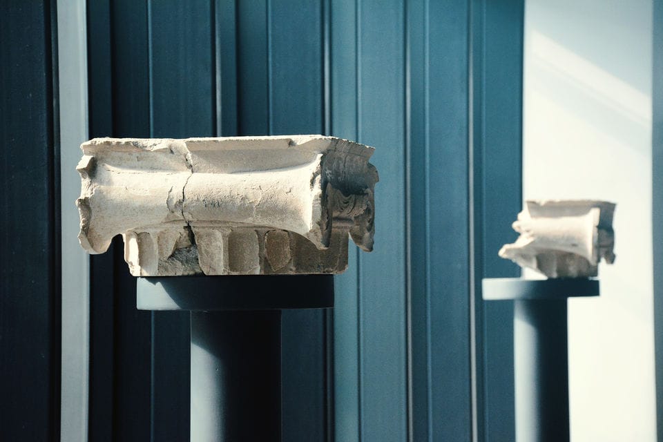 a pair of gloves on a shelf