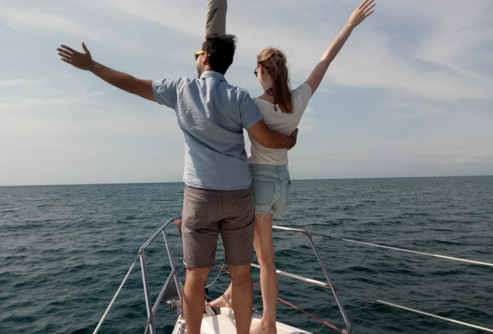 a man and woman on a boat