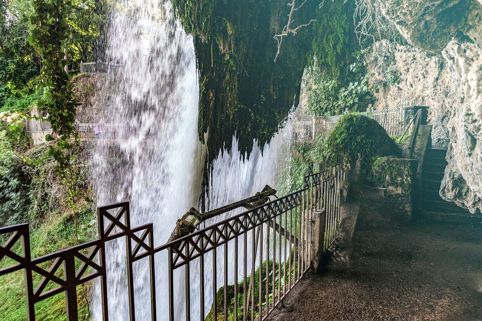 a waterfall in a park