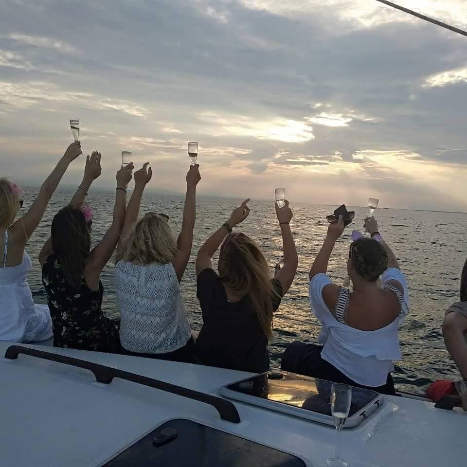 a group of people raising their hands