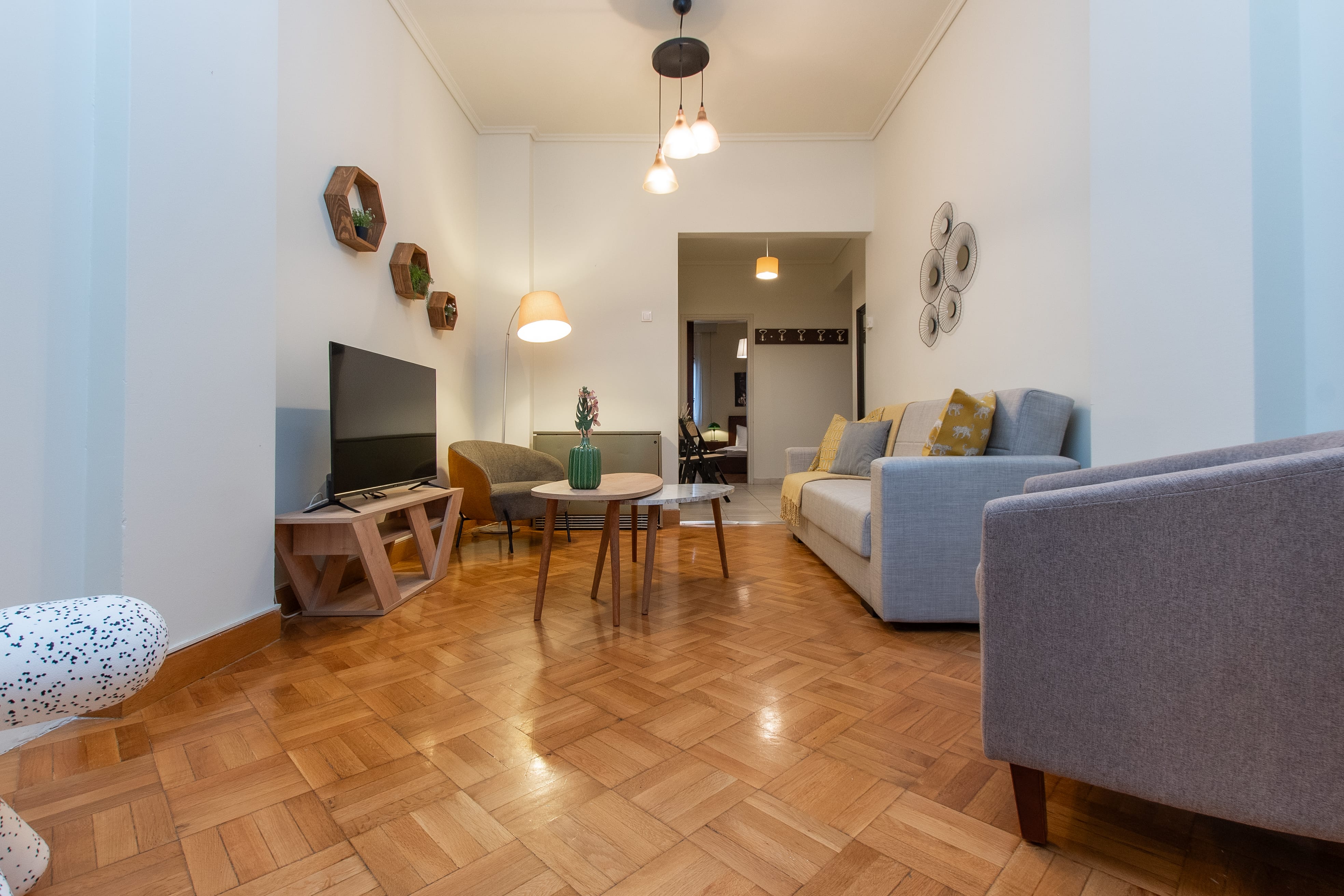 a living room with a wood floor