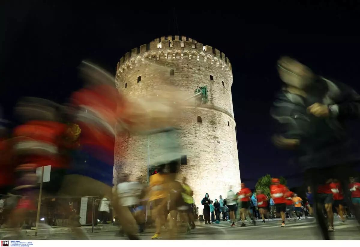 a large metal object with people around it