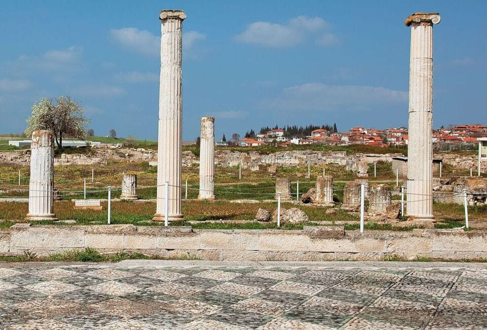 a group of pillars in a field
