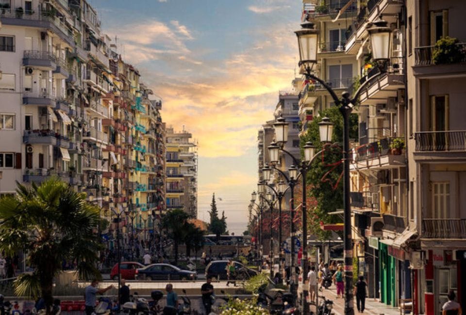 a street with buildings and people