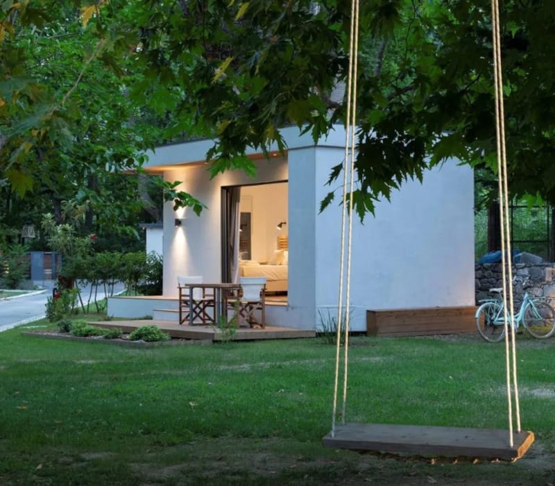 a house with trees and grass