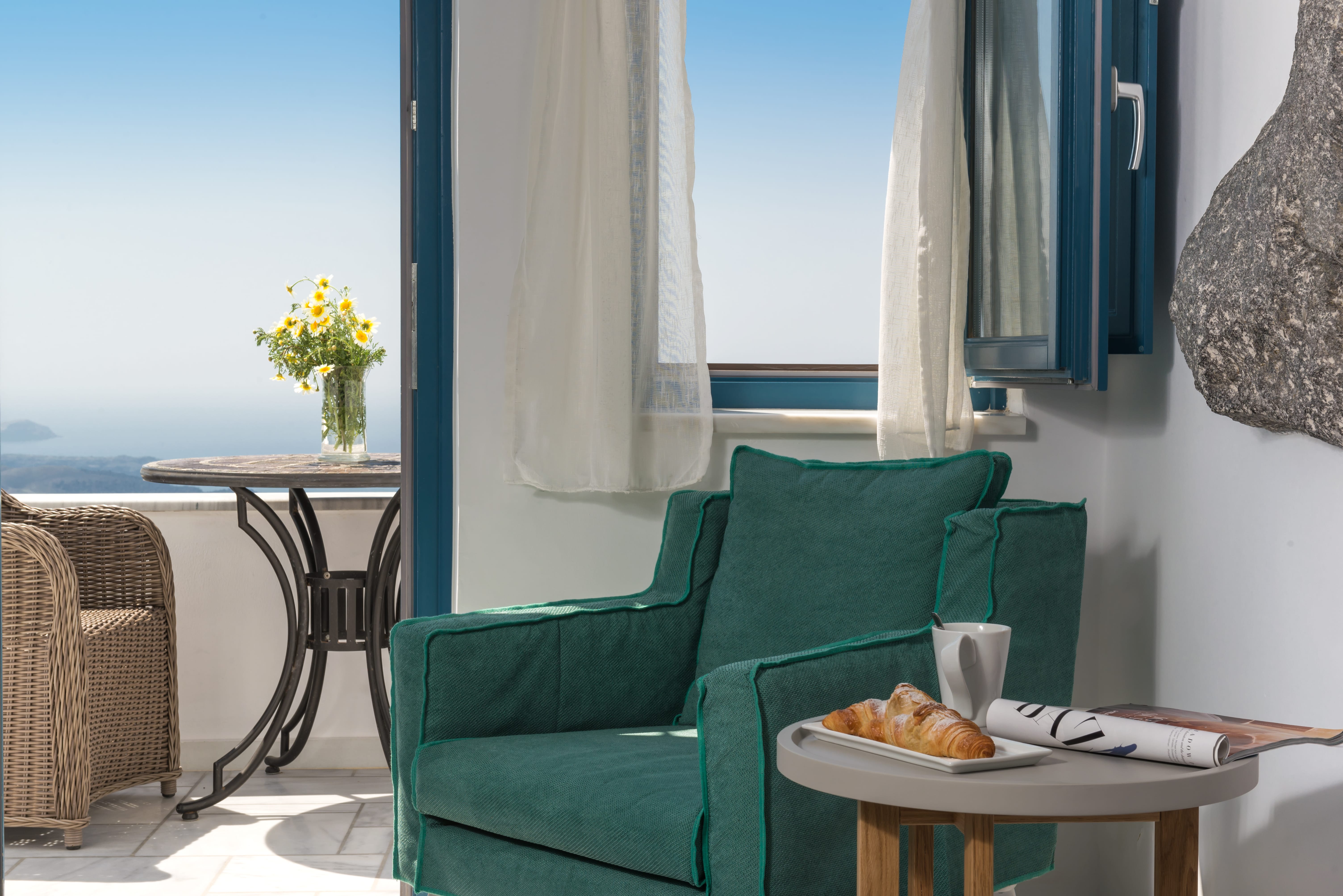 a green chair and a table