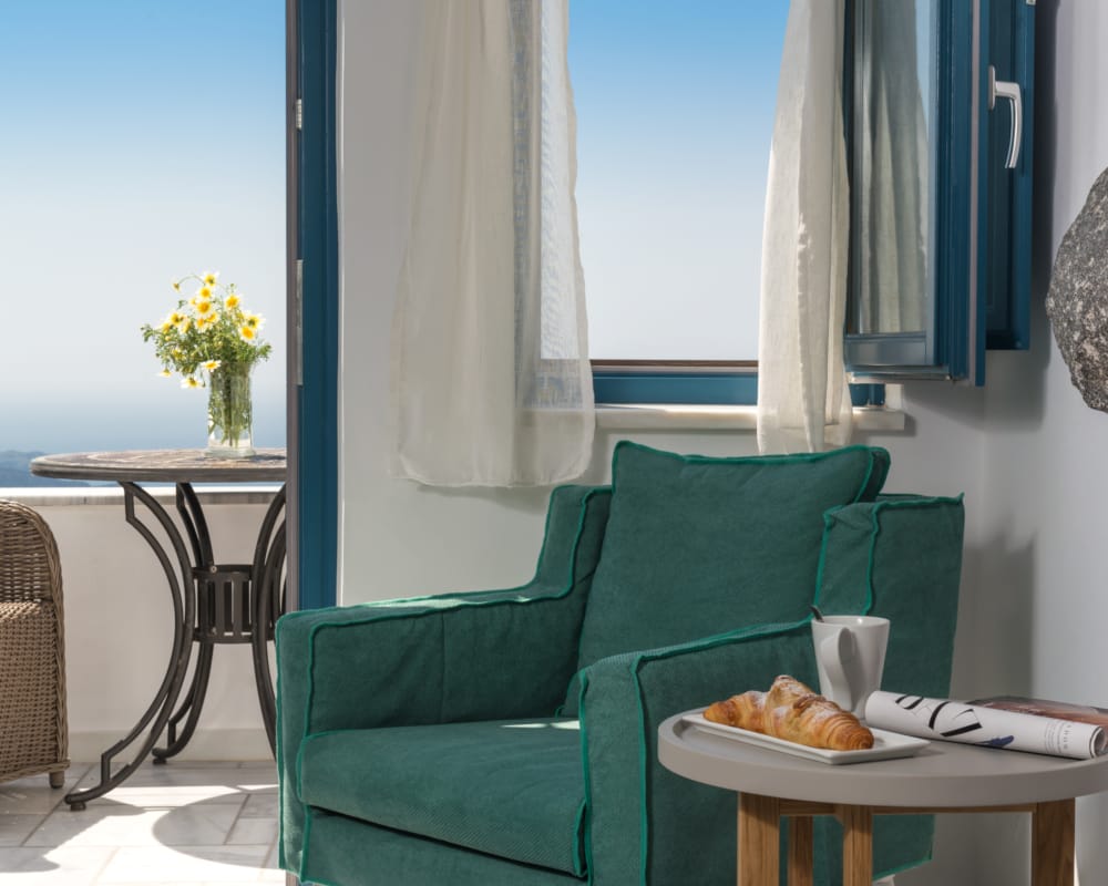 a green chair and a table