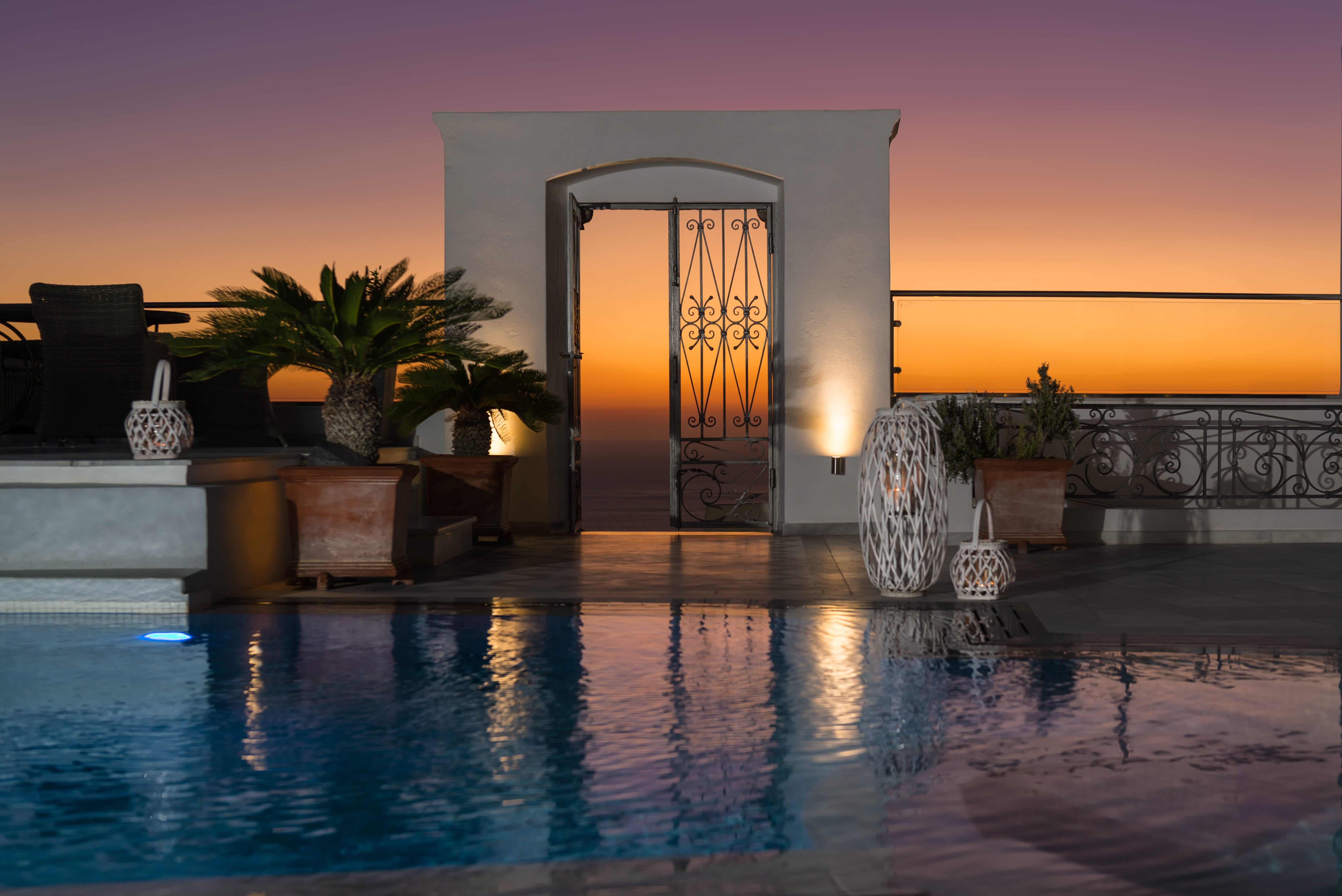 a building with a pool in front of it