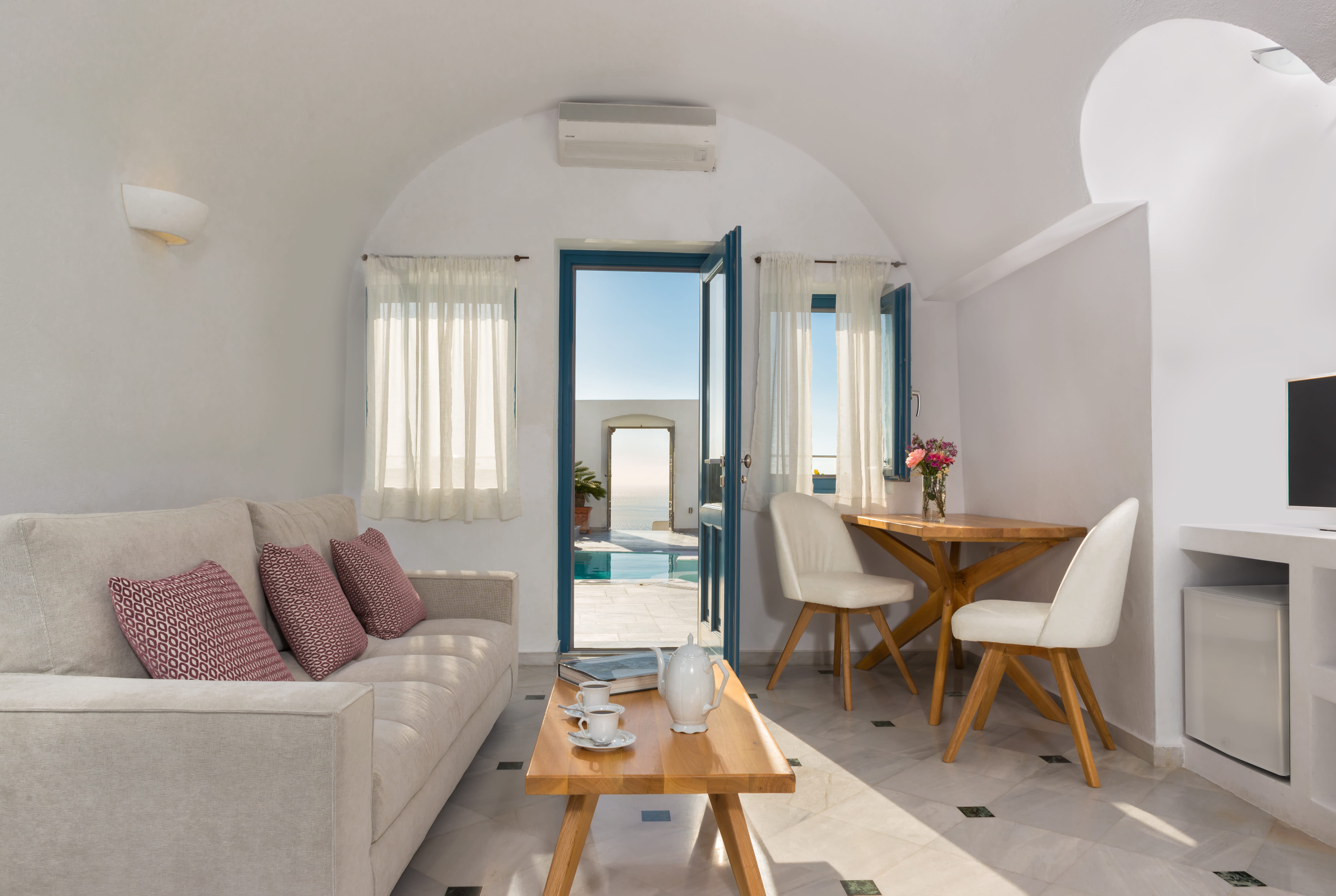 a living room with a couch and a table