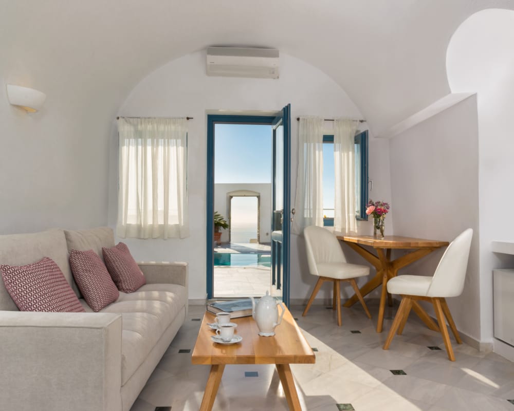 a living room with a couch and a table