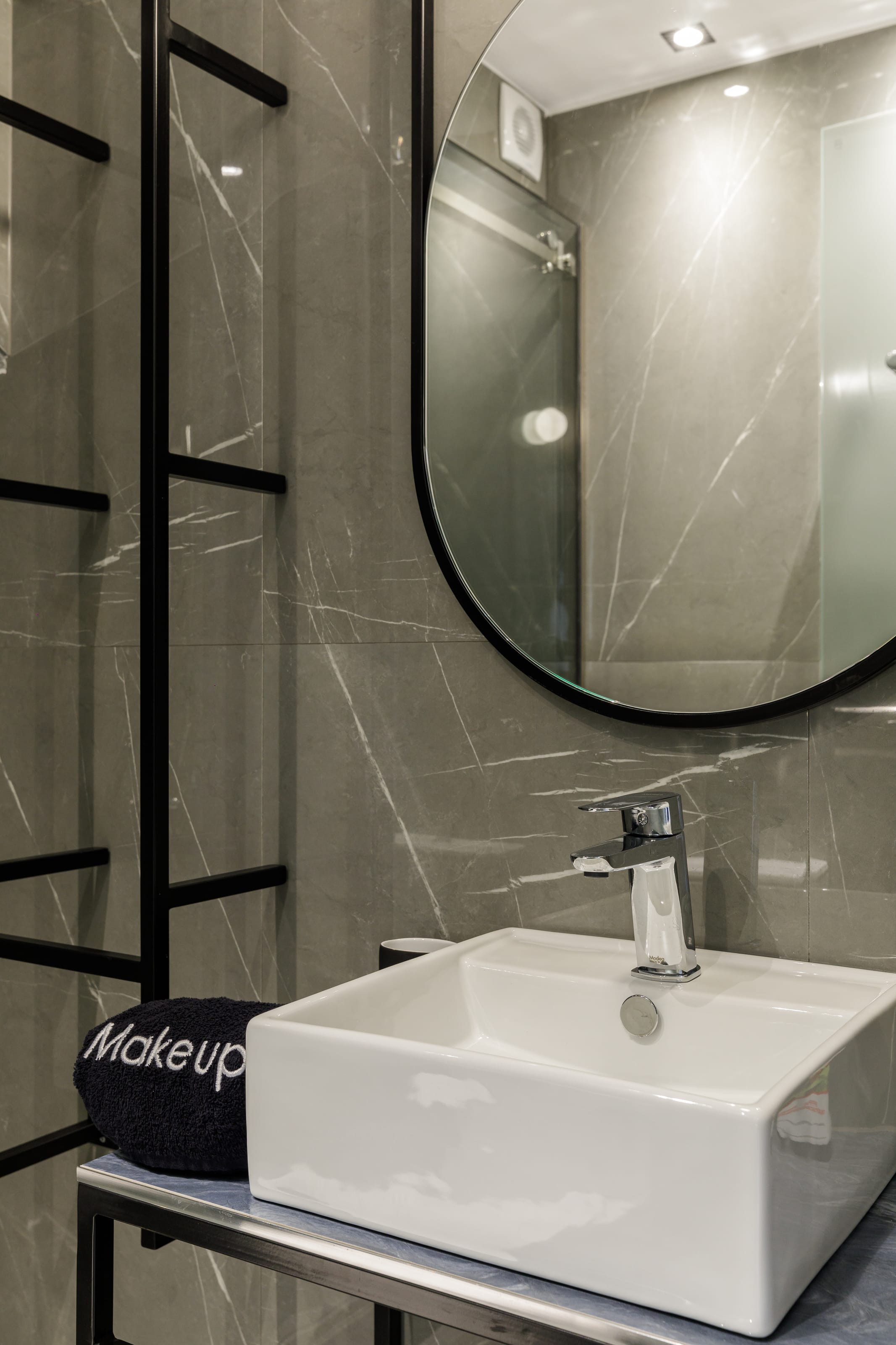 a bathroom with a large mirror