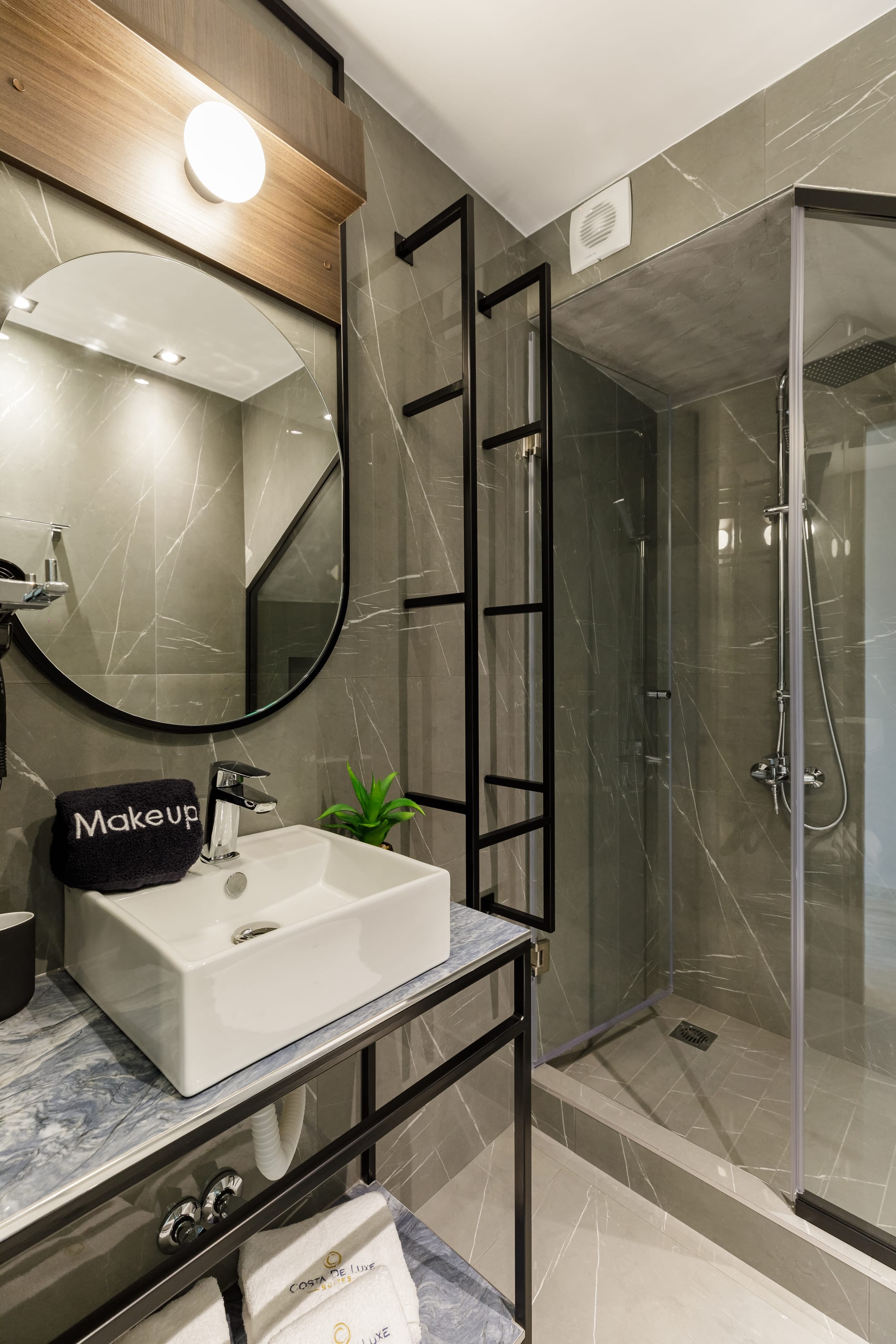 a bathroom with a glass shower